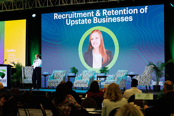 people sitting is a session at last year event