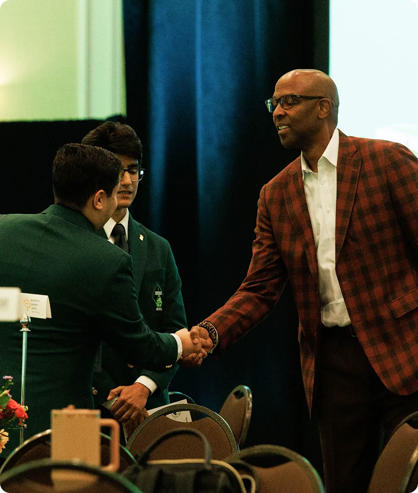 Shaking hands at a conference